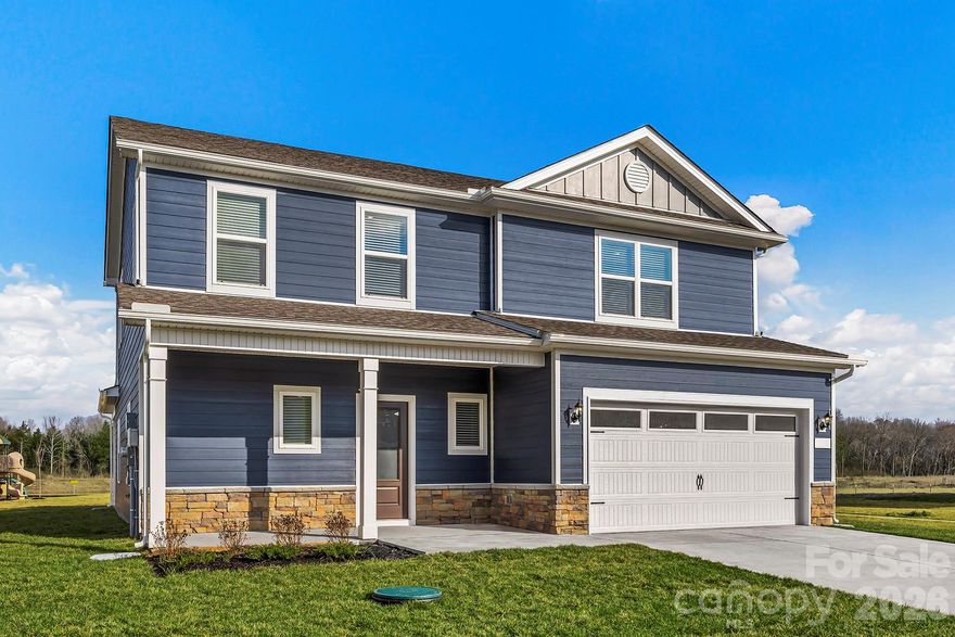 Welcome to The Hampton in Ascot Woods — a beautifully designed 2445 sq ft two-story home that seamlessly blends comfort, space, and style.

The main level features an open and inviting family room, complemented by a dedicated dining area ideal for entertaining and hosting holidays. The chef-ready kitchen is equipped with granite countertops, ample cabinetry, and a full suite of Whirlpool® stainless steel appliances—designed to make both everyday living and entertaining effortless.

The private primary suite offers a relaxing retreat with a private bath and a spacious walk-in closet. Upstairs, three additional bedrooms and a full bath provide flexibility for family, guests, or a home office.

This one is even better in person—let’s schedule a time for you to come see it!