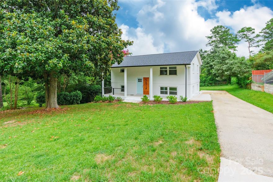 Recently renovated and move-in ready all brick home with massive covered front porch sitting on a large lot in convenient location in Rock Hill! This turnkey home features hardwood floors upstairs, neutral paint, renovated kitchen with quartz countertops, tile backsplash, new stainless appliances, and lots of cabinet space! All bedrooms have a ceiling fan with light, neutral paint, and hardwood or LVP flooring. Updated bathrooms with tile flooring, updated vanities with quartz countertops, and custom mirrors! Large concrete rear patio to enjoy summer evening gatherings, surrounded by mature trees and large backyard. New roof, new HVAC installed 2024-2025.