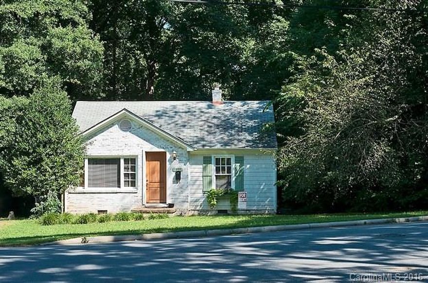 Charming cottage in a charming neighborhood.  Updated approx. 2007 years ago.  Roof March 2017, Furnace 2008. Hardwood floors throughout except for kitchen and bath.  Updated kitchen with original cabinetry,  renovated bath with walk-in shower.  Custom shutters and window box, copper chimney cap.  Cedar shake. Hot Merry Oaks, minutes to uptown. Open layout.  Kitchen with lots of light. Huge wooded lot. Greenway access. Community garden.  Sidewalks. Little Free Libraries.