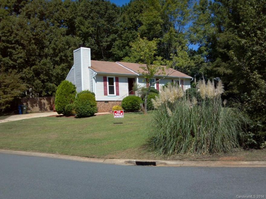 Wonderfully private & Transitional 3Br/1.5Ba ranch on large, corner lot with privacy fenced rear & oversized concrete driveway.  Cathedral ceiling with tall "plant shelf" wall seperates the kitchen and living space of the great room.  Sliding glass doors lead to large, recently stained deck overlooking serene wooded back yard with playground equipment & storage building (remains as-is).  There is also exterior storage room attached. Washer/Dryer remain-Transferrable home warranty in place.