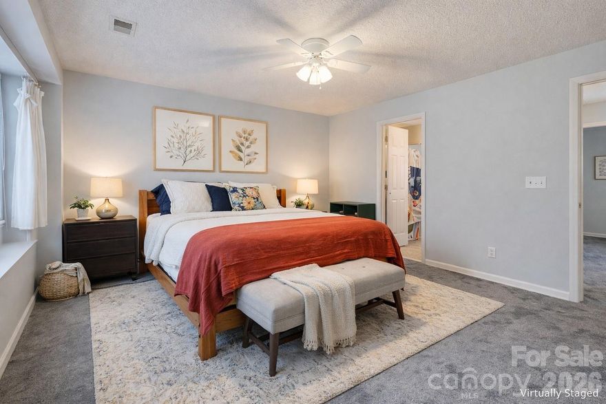SELLER OFFERING UP TO 4 MONTHS OF HOA DUES PAID WITH ACCEPTABLE OFFER — that's over $900 back in your pocket at closing! Welcome home to Prescott Village — where low-maintenance living meets thoughtful design. This updated 2-bed, 2.5-bath townhome offers two true primary suites, each with a walk-in closet and private full bath. One suite features a dedicated built-in vanity area outside the bath — a functional luxury that keeps your morning routine seamless and your space beautifully organized.
The open-concept main level is designed for real life: durable LVP flooring, recessed kitchen lighting, stainless steel appliances, and a layout that flows effortlessly from kitchen to dining to living. Seller conveys the refrigerator, washer, dryer, and Google smart thermostat — truly move-in ready.
Enjoy upstairs laundry, ceiling fans throughout, plantation shutters in one suite, generous under-stair storage, and a private rear patio with a natural buffer for added outdoor privacy. Attached one-car garage with interior access completes the package.
Your HOA covers the big stuff — roof, exterior maintenance, exterior paint, lawn care, water, and trash pickup — so you can spend less time managing and more time living. Community pool and direct access to Mallard Creek Greenway round out the lifestyle. Minutes from UNC Charlotte, Northlake Mall, I-77, and I-85.
Investors welcome — no rental cap at time of listing (buyer to verify).