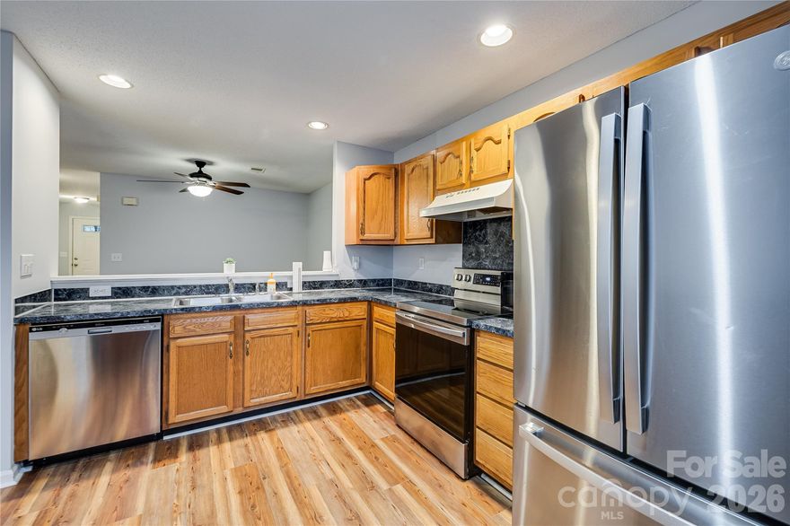 SELLER OFFERING UP TO 4 MONTHS OF HOA DUES PAID WITH ACCEPTABLE OFFER — that's over $900 back in your pocket at closing! Welcome home to Prescott Village — where low-maintenance living meets thoughtful design. This updated 2-bed, 2.5-bath townhome offers two true primary suites, each with a walk-in closet and private full bath. One suite features a dedicated built-in vanity area outside the bath — a functional luxury that keeps your morning routine seamless and your space beautifully organized.
The open-concept main level is designed for real life: durable LVP flooring, recessed kitchen lighting, stainless steel appliances, and a layout that flows effortlessly from kitchen to dining to living. Seller conveys the refrigerator, washer, dryer, and Google smart thermostat — truly move-in ready.
Enjoy upstairs laundry, ceiling fans throughout, plantation shutters in one suite, generous under-stair storage, and a private rear patio with a natural buffer for added outdoor privacy. Attached one-car garage with interior access completes the package.
Your HOA covers the big stuff — roof, exterior maintenance, exterior paint, lawn care, water, and trash pickup — so you can spend less time managing and more time living. Community pool and direct access to Mallard Creek Greenway round out the lifestyle. Minutes from UNC Charlotte, Northlake Mall, I-77, and I-85.
Investors welcome — no rental cap at time of listing (buyer to verify).