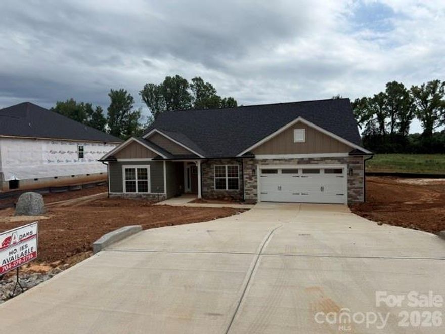 Only $1,000 down to write a contract! This brand-new construction home is situated on .98 acres in the new McNeely Farms subdivision in Mt. Ulla, NC. Conveniently located just minutes from downtown Mooresville, shopping, dining, and interstates 77 and 85.The 3,327 sq. ft. ranch with 4 bedrooms and an office and 3.5 bathrooms offers, 3 bedrooms, a flex space/office and 2.5 baths on the main level. The second floor includes a large bonus room, full bath, and a bedroom. The open-concept floor plan is designed for functionality and entertaining. Interior features include 9' ceilings, a spacious eat-in kitchen with oversized island, quartz countertops, tiled backsplash, gourmet stainless steel appliance package, and laminate wood flooring in the main living areas. The primary suite includes a 5' tiled shower. Exterior features include a 16’ x 14’ covered patio overlooking a large, level backyard in a peaceful setting, Hardie board siding and upgraded stone package. No HOA fees!  Closing cost paid (except prepaids and points) with use of preferred lender.  Flex cash available to lower interest rate!!
All photos are for representation purposes only