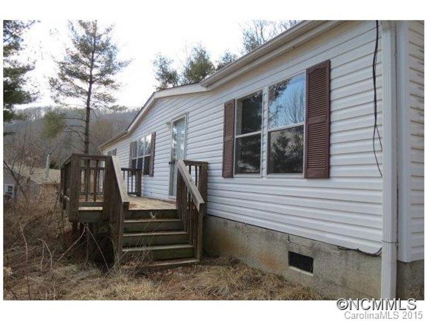 Enjoy mountain views from your front porch! Nice open floorplan, split bedrooms, large master bath, walk-in closets, spacious bedrooms, eat-in kitchen AND formal dining area, laundry room, lots of light, storage shed in back. Great investment property!