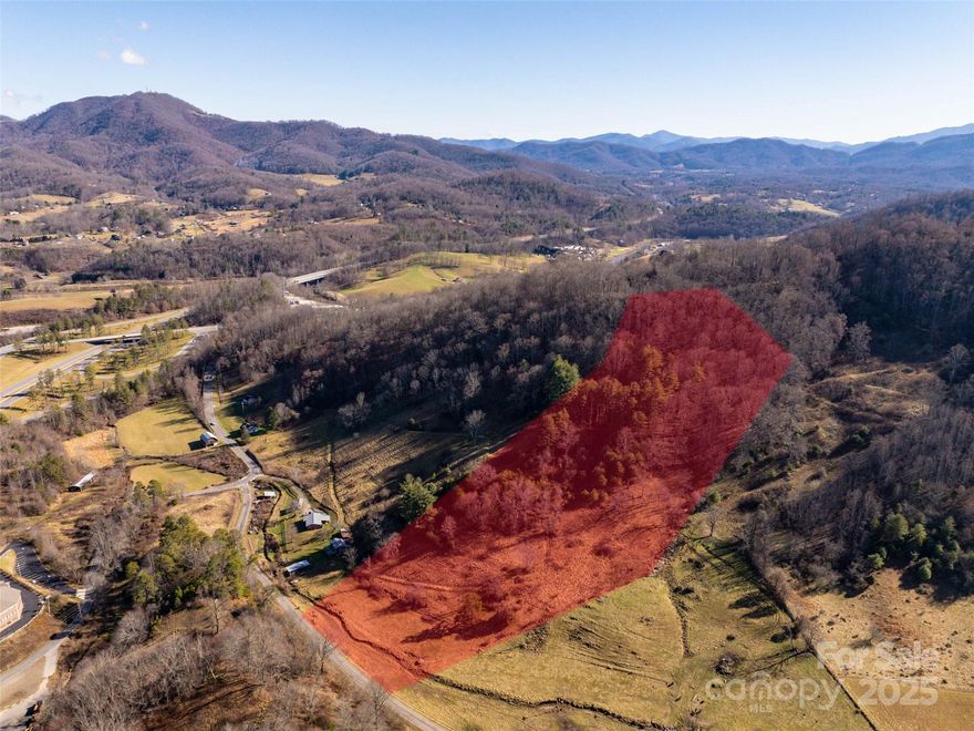 Great opportunity to build your private home in disable McElroy Cv in the Iron Duff community with this unrestricted 7.50+ acres with 160' state maintained rd creek frontage with level/rolling cleared pasture to steeper elevation to the top of the ridge and offers year round access and convenience to I-40 and much more.