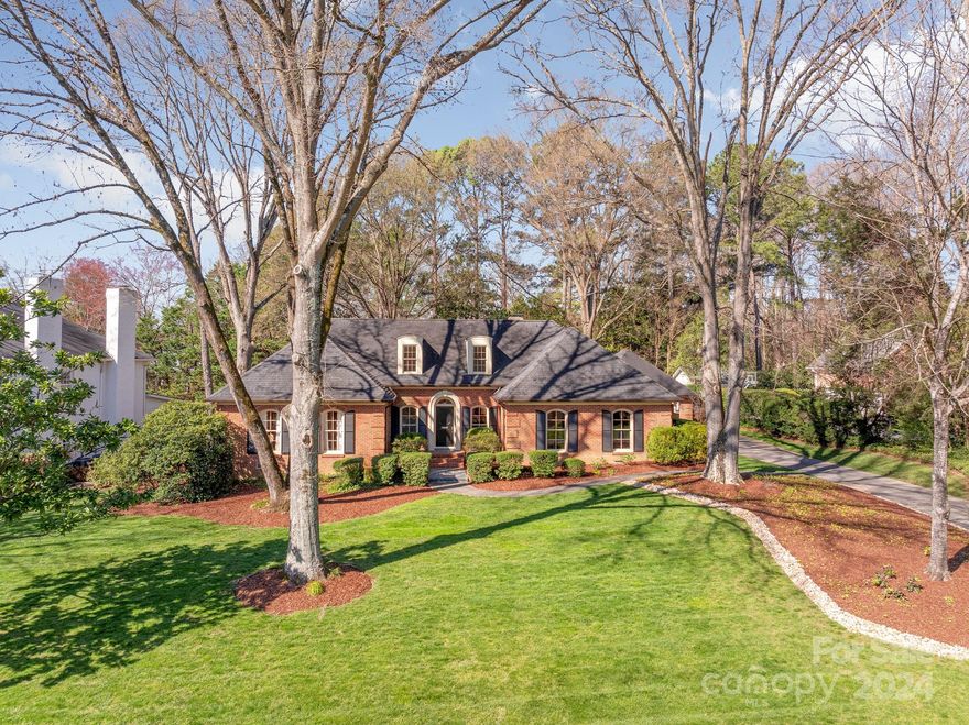 In the sought-after Foxcroft neighborhood, this welcoming 4-bedroom, 3-full-bath home has great curb appeal, comfortable living spaces and a generous, flat, half-acre lot. Traditional floor plan with 2 BR up and 2 down, sunny living room, formal dining room and spacious den with wood burning fireplace with gas starter, this home provides several inviting spaces for casual lounging or entertaining guests. Abundant square footage in the walk-in attics, located on both sides of upstairs area, provides an opportunity for storage, expansion or customization to suit your buyer's needs and preferences. Convenient to Southpark and a short distance from Sharon Elementary School and the Foxcroft Hills neighborhood Swim and Racquet Club.  Whether you're considering a remodel to make this home truly your own or envisioning the construction of your dream home on this prime lot, the possibilities are endless.