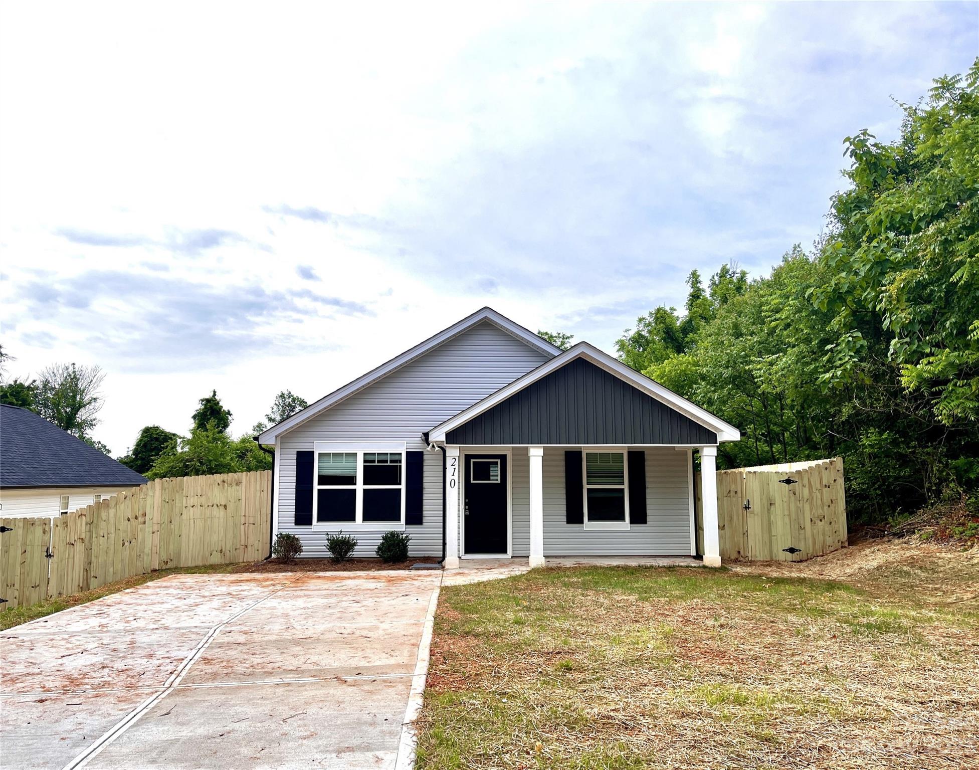 Photo 1 of 18 — 210 N Railroad Avenue, East Spencer, NC 28039