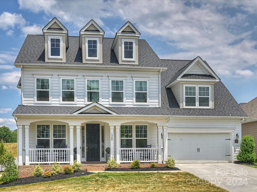 Rare newer build (2020) in popular Bonterra!  Bright, light-filled home with a modern yet classic feel inside and out.  Spacious floorplan with 5 bedrooms, 4 and a half baths, bonus, and an office.  Tasteful finishes throughout with gorgeous hardwoods and 10' ceilings on main.  Family room with fireplace; stunning kitchen with quartz countertops, large island, and breakfast nook.  Main floor also features a guest suite, office with french doors, and formal dining room. Upper level includes an expansive primary suite with a beautiful bathroom and large walk-in closet, bonus room, and 3 additional secondary bedrooms.  

Classic curb appeal with a rocking-chair front porch in one of Indian Trail's most sought-after neighborhoods:  Bonterra is an active, social community with a clubhouse, pool, fitness center, tennis and basketball courts, soccer fields, walking trails, playground, and equestrian facilities. This beautiful home is immaculate and completely move-in ready.