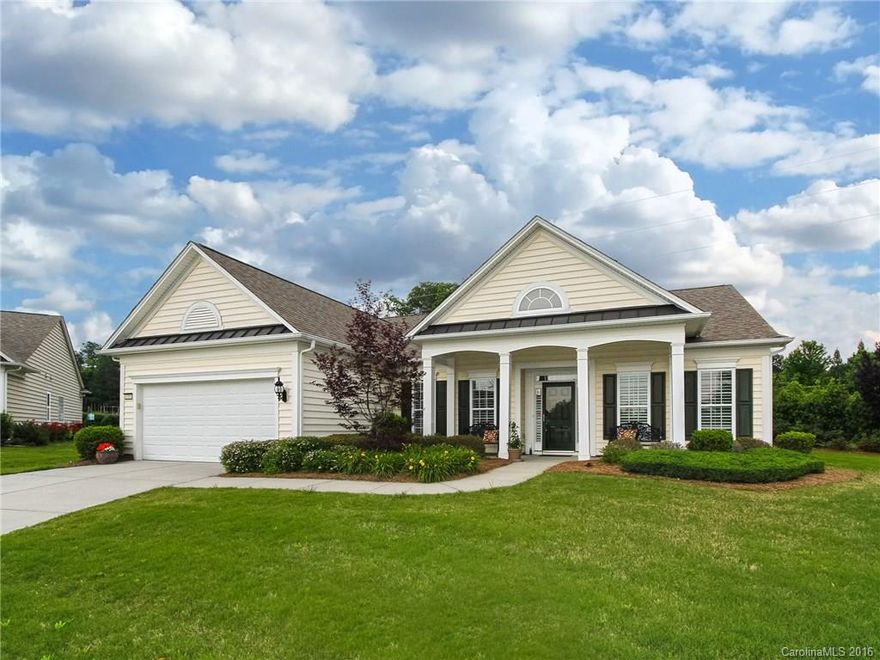 This beautiful Bluffton Cottage has a library (optional 3rd BR) & sunroom sits in a quiet cul-de-sac w/private backyard.  The expanded landscaped patio, automatic awning, brick wall and iron gate opens to the green space behind.  The interior has a gourmet kitchen, electric cooktop, stainless appliances, granite counters, under cabinet lighting, tile backsplash, plantation shutters, bookcases, gas fireplace and much more!  This home is move-in ready.