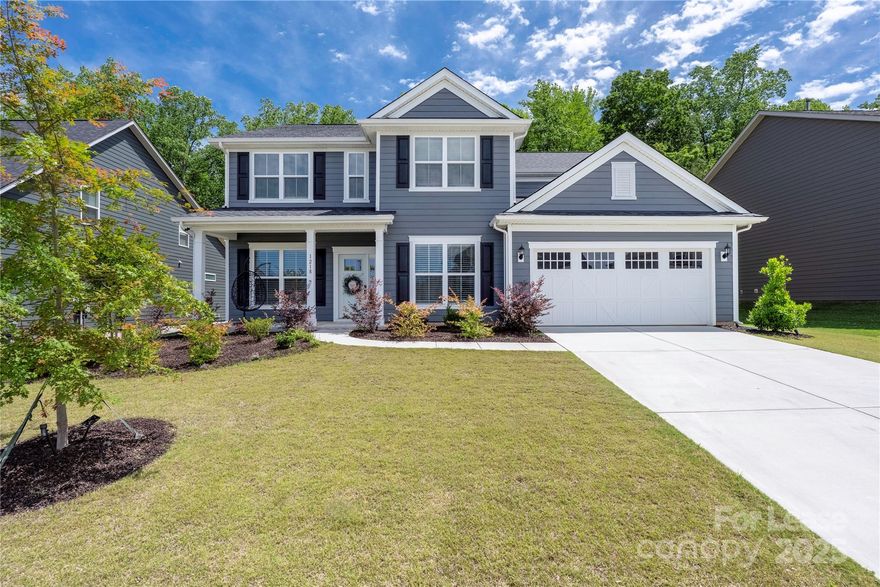 Experience the ideal blend of space, privacy, and elegance in this beautiful Riverton model home, built in 2022 and located in the desirable gated Bretagne community in Fort Mill, SC—just 5 minutes from Ballantyne and 30 from Uptown Charlotte. 
With 3,661 sq ft of heated space on nice lot backing to a protected tree-save area, this home offers 5 bedrooms, 4.5 baths (including 3 en-suites, and one guest bedroom on the main floor), a gourmet kitchen with KitchenAid appliance, LG Instaview fridge, plus a wine fridge, mini fridge, and Samsung washer/dryer (upstairs). 
Additional features include a formal dining room, private office/library, spacious great room with gas fireplace, and a sunroom. Upstairs, you'll find the owner’s suite with freestanding tub, rainfall walk-in shower, and dual walk-in closets, a spacious loft and three more bedrooms, all with walk-in closets. 
All of this in a highly graded school district.