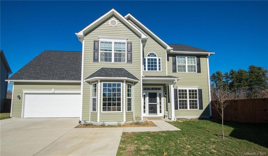 Don't miss this one!  Immaculate MOVE-IN READY four bedroom home in desirable community! Walking distance to French Broad River Park minutes from town. River and mountain views, level yard and large driveway. Beautifully crafted gardens out back full of perennials waiting on spring time.  Lots of room to entertain on the first level, spacious master suite, gourmet kitchen with gas range and convection oven, hardwoods on main, eat in kitchen overlooking the backyard and French Broad River.