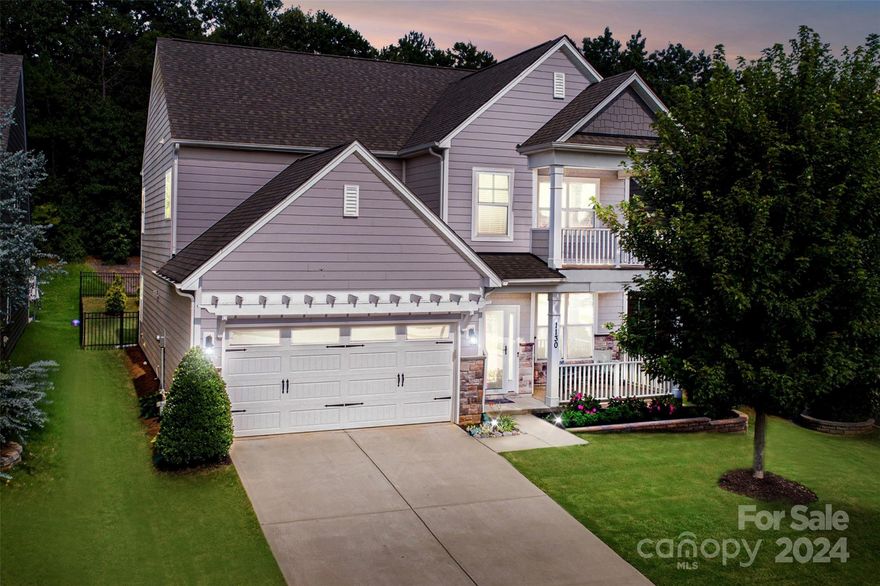 Charleston-style home with double porches tucked away on a quiet street with PRIVATE, fenced-in backyard offers 5 bedrooms and 4 full baths is move-in-ready.  The award-winning floor plan with 2 living areas, expansive kitchen island, dining room, 3rd-floor suite ideal for a theater room, and 1st-floor guest suite also suitable for an office.  Well-appointed NEW kitchen with luxury finishes; Kilth cabinets, granite, backsplash, under-mount lighting, gas range, wall oven, built-in microwave, etc.  The owner's suite is a retreat with a spa tub, separate rain shower, water closet, and dual sinks.  Pristine condition plus a new HVAC unit, dishwasher, and luxury vinyl plank floors.  So much outdoor living ready for a gas grill near the firepit and covered patio wired and ready for a TV.  Resort-like amenities and HOA fees only $60 a month! Invest in Indian Land near downtown Waxhaw, Marvin, and Ballantyne. Zoned for coveted schools.  Must see $70k list of upgrades that only this gem offers.