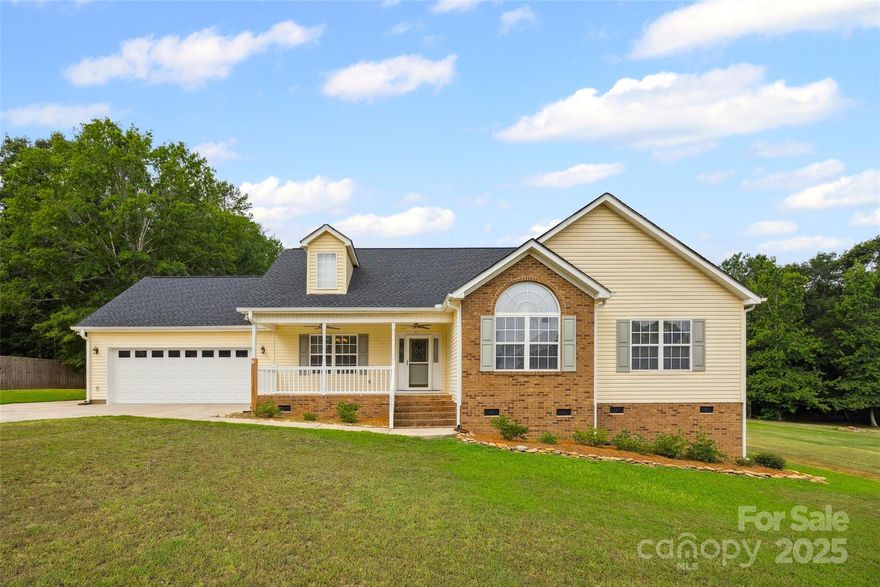 Welcome home to this beautifully maintained 3-bedroom, 2-bathroom property, offering thoughtful updates and comfortable living inside and out. Recent improvements include a garage, drop zone, roof, gutters, tankless water heater, and replaced water lines under the house. Inside, the kitchen and primary bath shine with updated quartz countertops, while vaulted ceilings in the living room add a spacious, airy feel. Enjoy the large backyard with a deck perfect for gatherings, plus a covered front porch overlooking a generous front yard. This home is clean, move-in ready, and offers a wonderful blend of updates and charm.