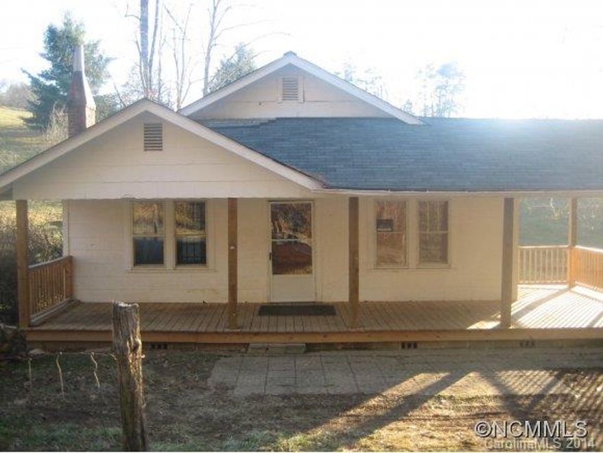 Absolutely gorgeous farm pasture, creek and fixer-upper farmhouse with 300+ SF of covered porch. Some repairs started, not finished. Functional kitchen and bath, original hardwoods throughout, basement storage, attic storage. Newer roof and porch! Beautiful original wood doors, fireplace, separate dining, laundry room! Plenty of room for your animals, creek-side, level area for garden and livable while updating. ALL 15 minutes to downtown!
