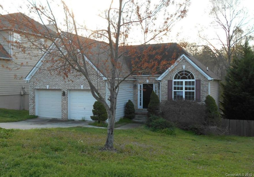 Just a few blocks from the community day dock and long Cove Marina for your boat storage !  A seasonal view of the water from your back deck. High ceilings, palladium and transom windows and heavy moldings. Brick front and brick fireplace in family room. Master bedroom has a trey ceiling and a soaking tub in master bath with separate shower. master is on main level, Two bedrooms and a bonus room on lower level. The back yard is fenced with a patio and also has a back deck on upper level.