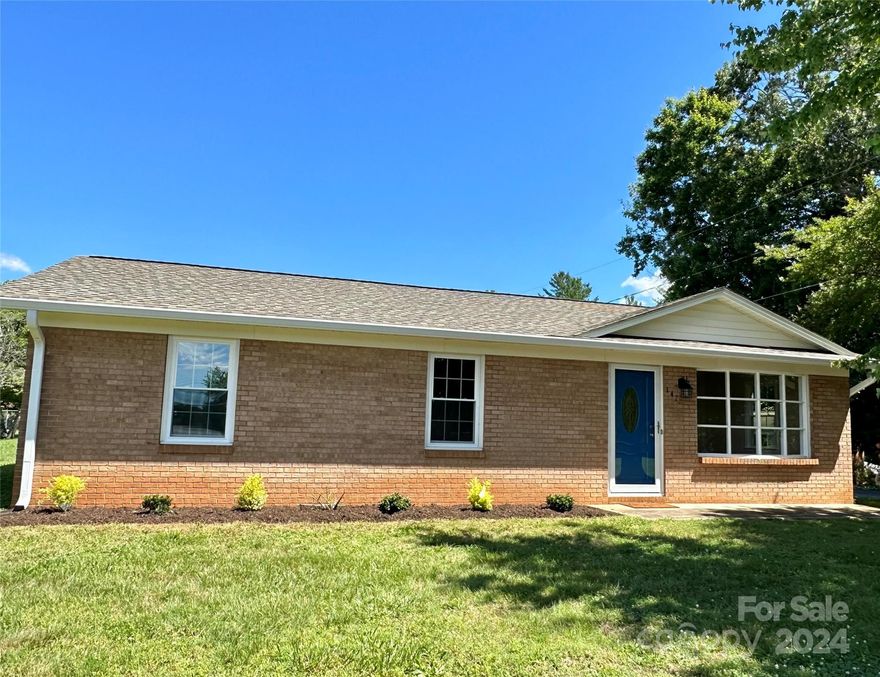 Newly renovated, full brick, single level home for sale in Hudson NC!  This 3 bedroom, 1 bath home features new flooring, windows, gutters, paint, bathroom vanity, gravel portion of the driveway, and new laundry area in the home. There is another laundry area in the exterior room on the carport area. It also has a large bay window in the living room area that lets in so much natural light! Located near park/recreation center, restaurants, shops, and local schools.  This property is ready for someone to call home!  Don't miss your chance to see it!