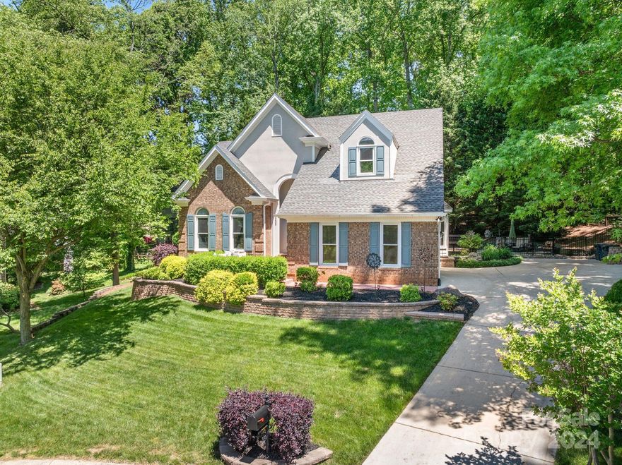 Welcome to your dream home! This impeccably maintained home has been updated where it matters!  New Hardie Board siding, HVAC, windows, encapsulated crawlspace and more! This spacious two-level gem boasts an incredible outdoor entertainment area featuring expansive decks with built-in benches, a stone patio, and fully fenced. Surrounded by mature trees, it's the perfect spot for gatherings. Enjoy the convenience of a main-level master bedroom and bathroom, reminiscent of a ranch-style layout, while upstairs, find bright and roomy bedrooms. The remodeled bathroom is a standout, showcasing modern luxury. With triple-pane windows throughout, energy efficiency is guaranteed, keeping you cozy in all seasons. Ample storage abounds, including a walk-in pantry, master closet, and attic space with shelves.  Step into this home and experience true craftsmanship and quality, reminiscent of a bygone era when homes were built to last. Wynfield offers an ideal location with ample amenities!