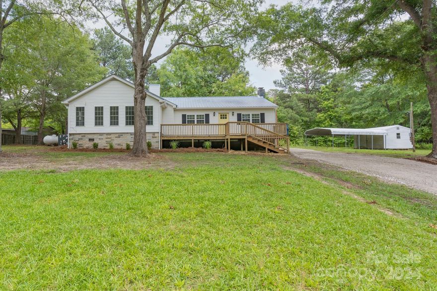 Come see this newly renovated ranch in the county on an acre lot.  Enjoy the sounds of nature from your front or back porch.  This home features 3 bedrooms, 2 bathrooms, two fireplaces, multiple seating areas, laundry area, and a flex/office room.  The large front yard offers plenty of space to gather or play.
