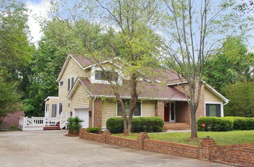 Rutenburg Contemporary Features Soaring Ceilings and Offers Tons of Options for Buyer Wanting Lots of Space.  Popcorn Ceilings Removed & Fresh Paint (2014) on the Main Two Levels.  Exterior Painted -2013.   Wonderful 1500 SF Finished Basement has Stone Fireplace and 3 bedrooms!  There is also a Heated/Air Conditioned Out Building with Bathroom. Original Appliances. Rustic Sunroom overlooks  Mountain-like Back yard.  Needs Your TLC...priced to sell in current condition.  Motivated seller