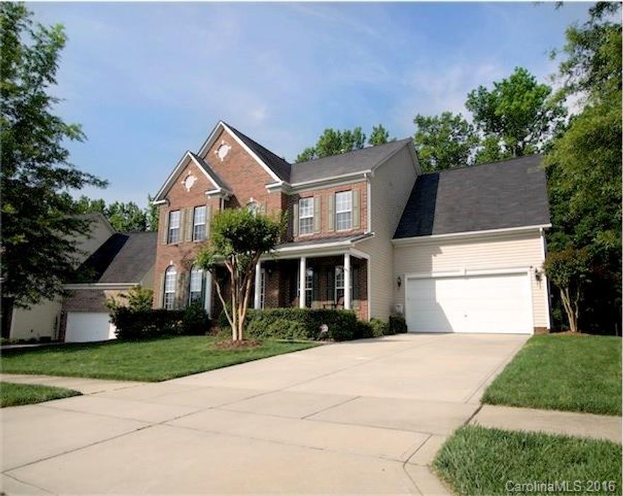 Move in ready 5 bedroom home w/ guest room on main floor! 9' ceilings throughout. Extensive moulding package. Gourmet kitchen features pendant & under cabinet lighting, upgraded blk appliances inc dbl ovens, microwave, gas cook top. Large island & gleaming backsplash.  Screen porch with vaulted, bead board ceiling, ceiling fan, & wood burning fireplace overlooks large level yard & wooded area. 4 spacious bedrooms upstairs including the master suite w/ dual closets, bonus room, & two hall baths!