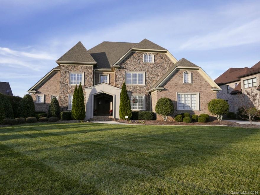 Beautiful meticulously maintained 3 story home has spacious gourmet kitchen w/granite, oversized center island w/granite and vegetable sink, upgraded Thermador appliances & SubZero refrigerator, Lrg Master suite on Main Level w/dbl Tray ceiling & sitting area, spacious master ba w/WIC, upgraded molding & trim package throughout home, media/rec rm & bedroom on 3rd level, 2 fireplaces, tons of storage space, professionally landscaped. Custom built home by Holevas and Holton.