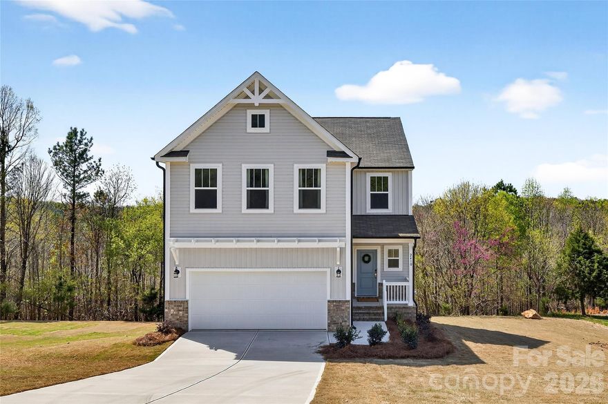 Quick Move-In Opportunity in Grandview – Albemarle, NC! This newly built semi-custom 5 BR/3.5BA home with basement situated on nearly a half-acre, offers upgraded features and a modern open floor plan designed for comfort and functionality. The spacious main level includes a bright great room and a stylish kitchen with quartz countertops, tile backsplash, and upgraded cabinetry. Upstairs, enjoy a large loft, convenient laundry room, and generously sized bedrooms. The luxurious primary suite boasts a tiled walk-in shower and a spacious walk-in closet. Basement features finished rec room, bedroom, and additional full bath.   Residents enjoy scenic surroundings, nearby parks, and easy access to shopping, dining, and downtown Albemarle. With its blend of quality construction and thoughtful design, this quick move-in home is the perfect fit for modern living in a growing area!