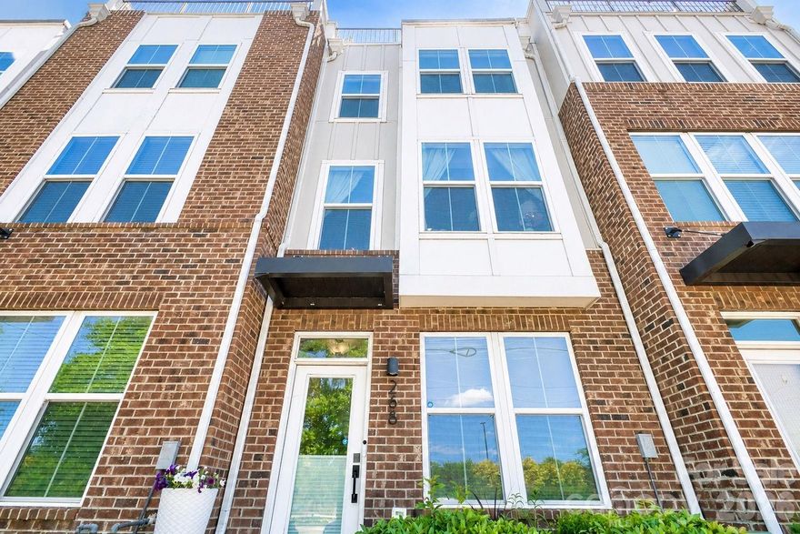 Located in the highly desirable Optimist Park area, this 4-story townhome offers exceptional city living with a rooftop terrace showcasing views of the Charlotte skyline. The home features 3 bedrooms, 3.5 bathrooms, and a flexible loft space ideal for an office, bonus room, or additional living area. Thoughtfully equipped with a tankless water heater, all appliances, and whole-house surge protection. Enjoy walkability with just a short 3-minute stroll to the light rail station and Optimist Hall for dining, shopping, and entertainment. This is a townhome that you don't want to miss out on!