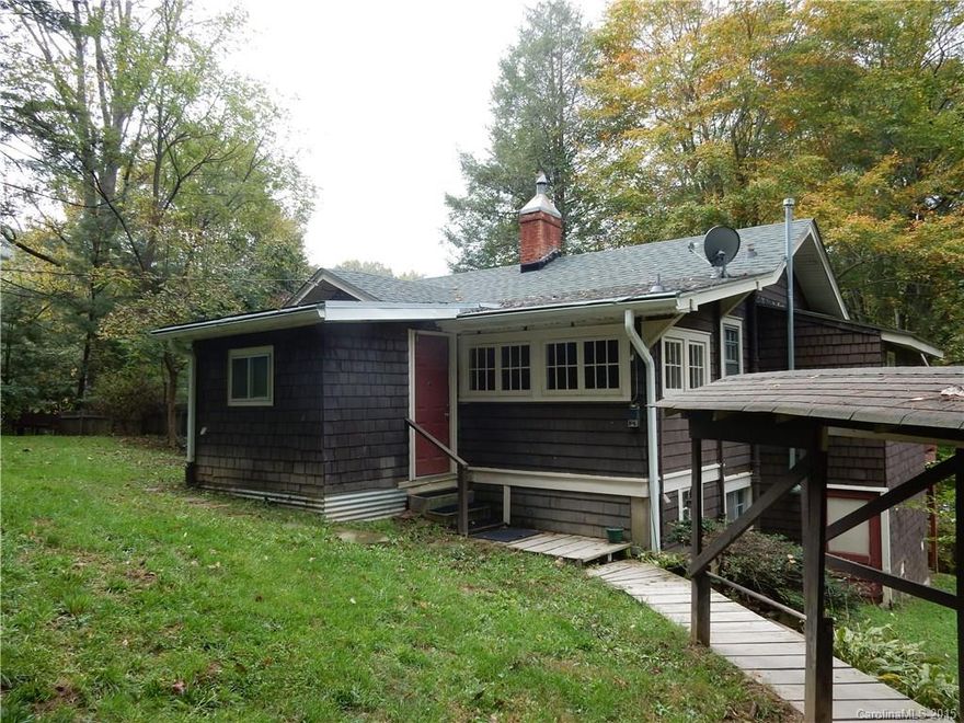 Rustic two story house in Weaverville. Mature trees, out buildings with easy access to Highway 26. Two additional bonus rooms and bathroom in lower level.  Motivated Sellers...Please make offer!