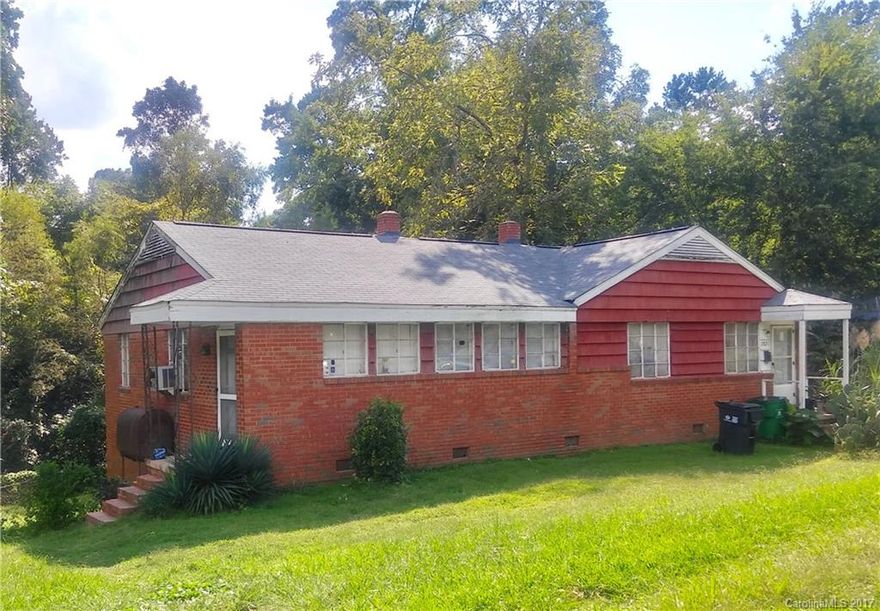 Brick exterior duplex (2 apartments), located minutes/outside of Uptown Charlotte with lots of new development in its surroundings. The roof approx. 10 years old, gas floor furnace on both apartments installed 2014, per seller. Approximately 1/2 acre lot, likely to be a great property to buy/hold or buy/renovate. Offered thousands below fully remodeled comparable properties. Great buy/hold or buy/remodel. Tenant Occupied, Do not disturb tenants. Basement/Additional Space.