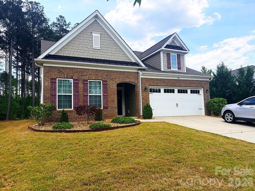 Welcome to your 4BR/3BA 1.5-story home in amenity-rich Imagery, a 55+ community where nature abounds on a peninsula of Mountain Island Lake! This 2,762 sf home offers a large Owner's Suite on the main level with a sitting area and a covered porch. Enjoy an open floor plan with an extended Great Room, LVP floors, a Gourmet Kitchen with a gas cooktop, granite counters, stainless steel appliances, a convection oven, a huge island, and a walk-in pantry. Upstairs, you'll find a bedroom, a full bath, and a roomy bonus room with lots of storage. Walk out back and enjoy your brick paver patio and fire pit or enjoy Imagery's heated pool, pickleball, tennis, beach, trails, waterside parks, arts studio, sewing cabin, fitness center, library, game room, and dog park. Lawn maintenance and an on-site Lifestyle Director are also included! A WATERFRONT PARK with BOAT DOCKS, JET SKI SLIPS, and KAYAK ACCESS IS UNDER CONSTRUCTION! WOW LOCATION: 10 mins to local shopping and I-485, 20 mins to the Airport, Uptown, major shopping, restaurants, medical facilities, and Lake Norman. Under-55 buyers are welcome!