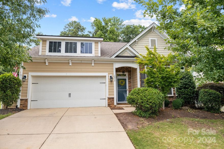 A must see! This stunning 1.5-story home has an open floor plan that features an extended living room with a sunroom and a beautiful eat-in kitchen and TONS of natural light. Enjoy the convenience of having the primary bedroom, two additional bedrooms, and laundry/mudroom all on the main floor! Upstairs, discover a large bonus room, an additional bedroom, and a full bath. The backyard offers privacy landscaping for ultimate relaxation by the outdoor fireplace. You don't want to miss all the added custom features this home has to offer- from the mudroom to the kitchen and ensuite bathroom. Come see all this home and the amenity-filled community have to offer.