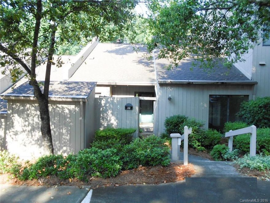 Back on the market !   Lakeside community with gated entrance offers country club with golf course, pool, walking trails, tennis, waterfront park and marina. The living room and master bedroom have vaulted ceilings. Sitting room or sunroom opens onto expanded back patio which overlooks a lovely green space area and walking trail. Lots of counter space and cabinets in the kitchen. Outside storage closet.