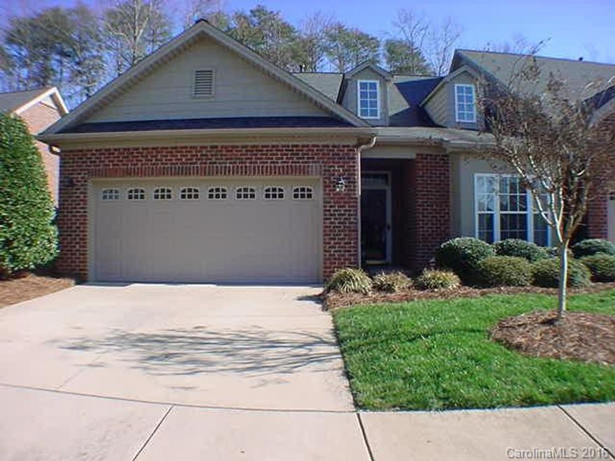 Carefree living in this end-unit townhouse with 2 car garage. Great condition, lightly lived in. Gas log fireplace in open great room featuring cathedral ceiling. Closed in sun room enclosed with a privacy fence offers serene living space. Features TV nook, tile back splash, under cabinet lighting, track lighting, a patio, and master bath has double sinks, plus more.