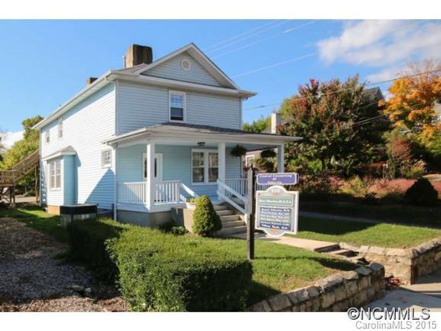Converted/updated commercial/office space currently used for counseling services within walking distance of Downtown. Easy access from I-240, Merrimon Ave, & Charlotte St. Multiple potential uses: office/salon/medical/residential live-work Building has 2 levels; each level has reception area & restroom. Covered front porch on main level; 2nd level has separate entrance & deck at rear. Potential for duplex. Off street parking