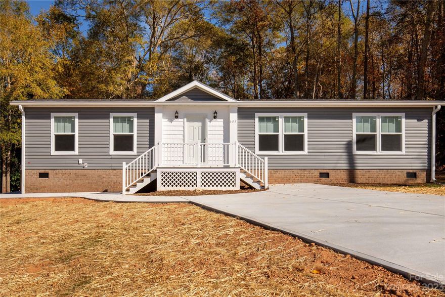 Step inside and discover a warm and inviting living space, filled with natural light that creates a cozy atmosphere for you and your loved ones. The open-concept design seamlessly connects the living room, dining area, and a well-appointed kitchen, making it perfect for gatherings and entertaining.  Step outside to your own oasis – a generous deck where you can enjoy morning coffee or simply unwind in the fresh air. The property also features a convenient storage shed and a detached 1-car garage to meet all your storage and parking needs.