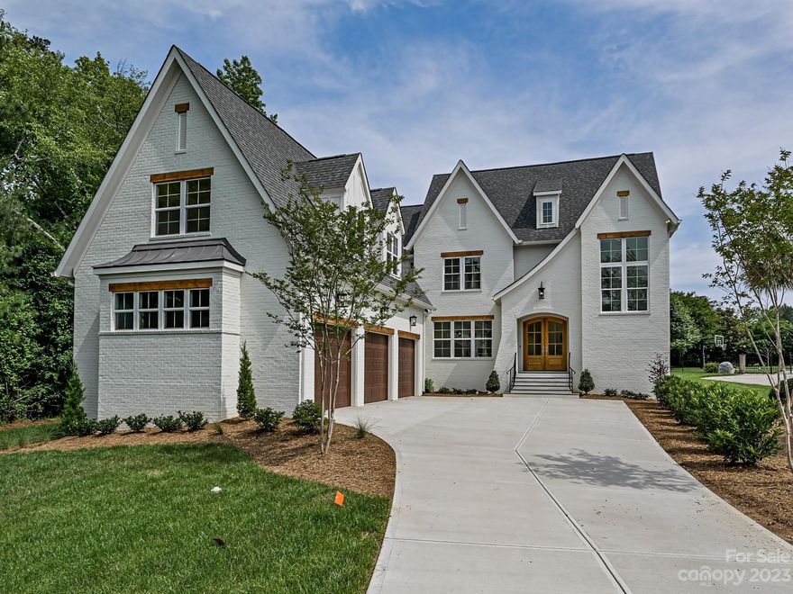 NEW CONSTRUCTION custom home within the gates of Providence Downs South! Stunning 4 bed/4.5 bath, 4363sf with 3 stall garage & bonus room above on a quiet cul-de-sac. Double door entry leads to centralized two story vaulted great room with gas fireplace and wall of sliders overlooking covered patio/yard with room for a pool. Kitchen boasts over-sized island, quartz counters, full size side by side built in fridge, Wolf 36” gas stove & walk in pantry.  Lovely main floor primary features vaulted ceilings, double vanity, frameless glass shower, soaking tub and large walk in closet. Wood flooring throughout including second floor loft, bedrooms and massive bonus room/office with wet bar and wine fridge. Sealed & conditioned crawl, tankless water heater, irrigation. Backed by 2 year full/10 year structural builder warranty! Unparalleled PDS amenities include: clubhouse with fitness, pool, lazy river, sports & tennis courts, playgrounds & more all located within top-rated Marvin schools.