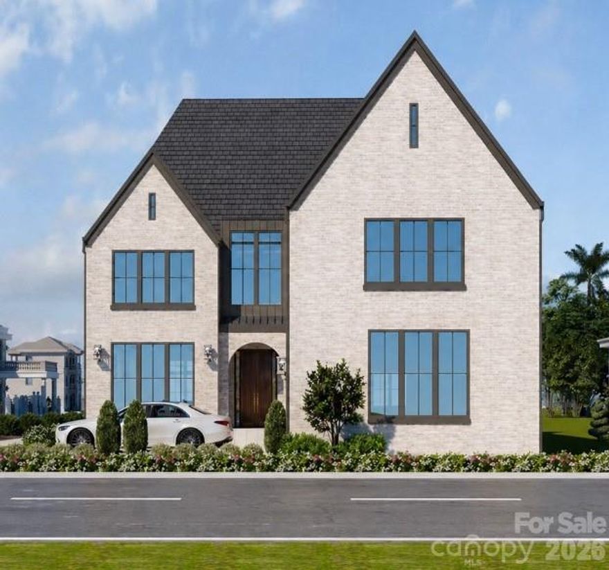 Set on a premier corner lot in the heart of Dilworth, just moments from South Blvd with a short walk to nearby dining and retail, this 5,514 sq ft brick residence reflects European design with a touch of modern, offering a refined lifestyle comparable to luxury Uptown Charlotte living within one of the city’s most established neighborhoods. The main level is thoughtfully curated, anchored by a private primary suite featuring a spa-inspired bath and dedicated laundry. Light-filled living spaces unfold seamlessly, centered around a beautifully designed kitchen that balances elegance with everyday functionality. A scullery and custom cabinetry provide added convenience, while white oak flooring, tailored millwork, and an elevator contribute to the home’s understated sophistication. The covered rear porch extends the living space outdoors, overlooking a flat fenced backyard and creating a natural connection between interior and exterior. Spacious back yard has potential for future pool installation. Upstairs, four additional bedrooms are complimented by a home movie theater including projector and movie screen, second laundry, and a spacious bonus room with fireplace. A private balcony offers elevated views toward Uptown Charlotte, adding a distinctive finishing touch. An exceptional opportunity to own a newly constructed home of quiet luxury and architectural intention, set within one of Charlotte’s most desirable addresses. ***Includes a 6 year home warranty!!!***