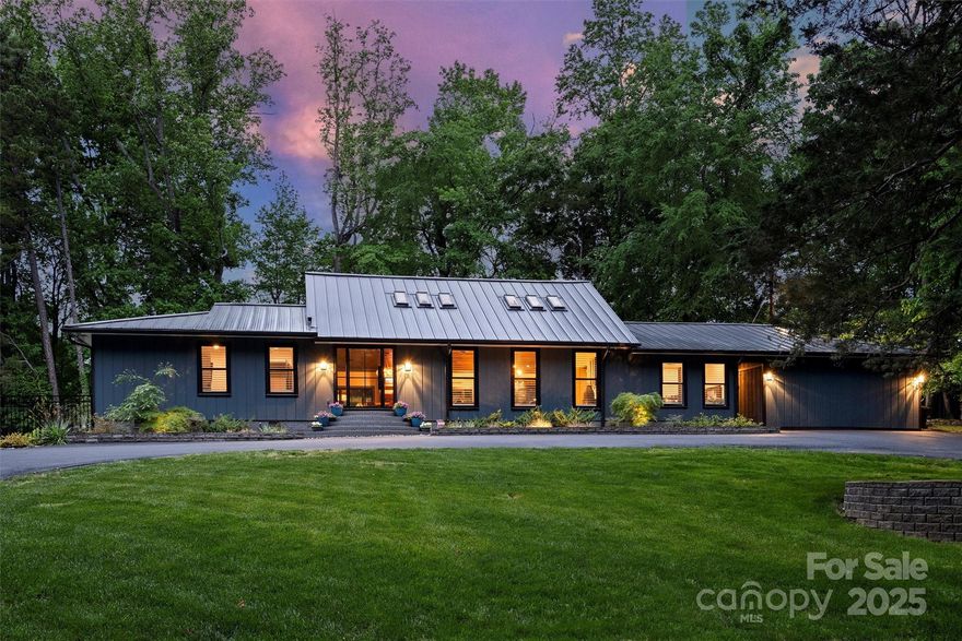 Discover luxurious living on this serene 9.58 acre property with no HOA and just minutes from downtown Mint Hill. With a winding private driveway that opens up to your expansive retreat. This 4-bedroom, 3-full bathroom home features a fully-loaded theater room, stadium lit sport court, in-ground saltwater pool, and 4-car garage. The open kitchen boasts an oversized island adjacent to a walk-in pantry and mudroom. Heated floors from the pool to hallway bath to keep you warm, tongue and groove hardwood ceilings, custom iron entry doors, plantation shutters, and 50-year metal roof are just a few of the custom details added to this home. The Culligan whole house water softener complements the private well and septic system, leaving electricity as your only utility bill. Outdoor amenities include covered patio, professional landscaping, in-ground irrigation, fenced zoysia yard, and outdoor sound system. Enjoy almost 10 acres of luxurious living!