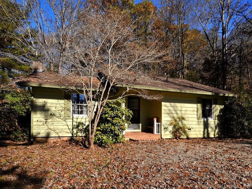 Very sweet cottage on private lot within walking distance to Main Street. Large back deck, spacious vaulted living room with fireplace, eat-in kitchen, outbuilding that can be transformed to a studio, and 2 full bathrooms. You can move right in, or give it some TLC to make it yours.