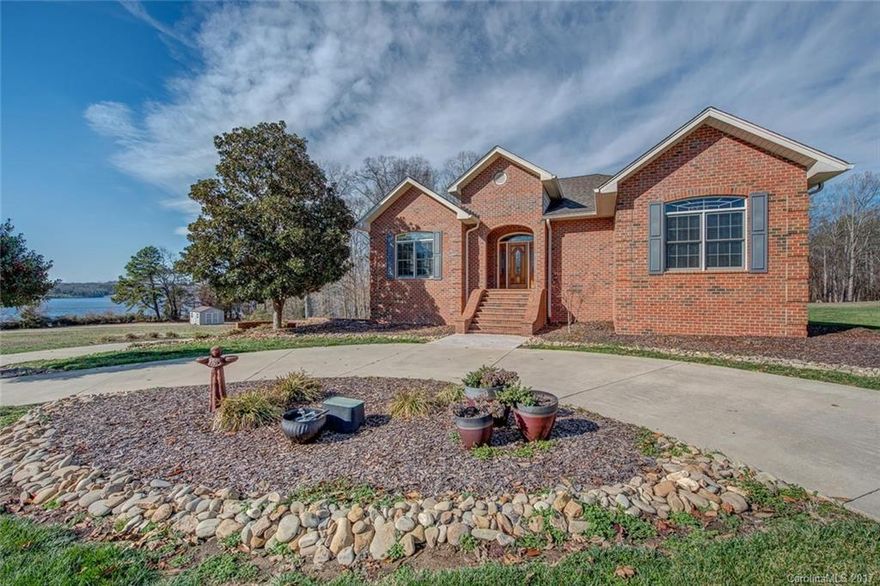 Simply charming basement home. Main level features open split bedroom plan with wood floors. Lake & beautiful sunset views from living area plus master bedroom seasonal lake view. Granite & stainless appliances and maple cabinetry. Basement features 2.5 car garage with 3 doors plus a finished playroom and full bath all with HVAC and 2 vents for garage.