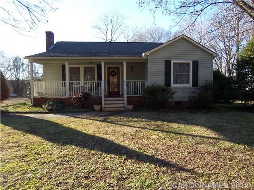 Recent upgrades with newly remodeled kitchen and bath.  Hardwood floors.  New front door and paint.  Newer outside vinyl.  Roof 2011.  New side porch.  Single detached garage.