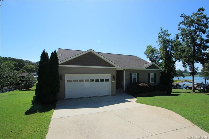 Spacious waterview home w/ full finished basement offers plenty of room to spread out. Generously upgraded living w/ high quality, finished walk out basement & oversized deck to relax & enjoy lake views.  Extended patio & backyard play area are great for entertaining. Deeded lake access, no HOA, low traveled, mature community offers the feel of a small town but less than 1 mile to shopping at an all new Publix at The Village At Sherrills Ford.  Easy access to hwy 16 / Denver & Mooresville.