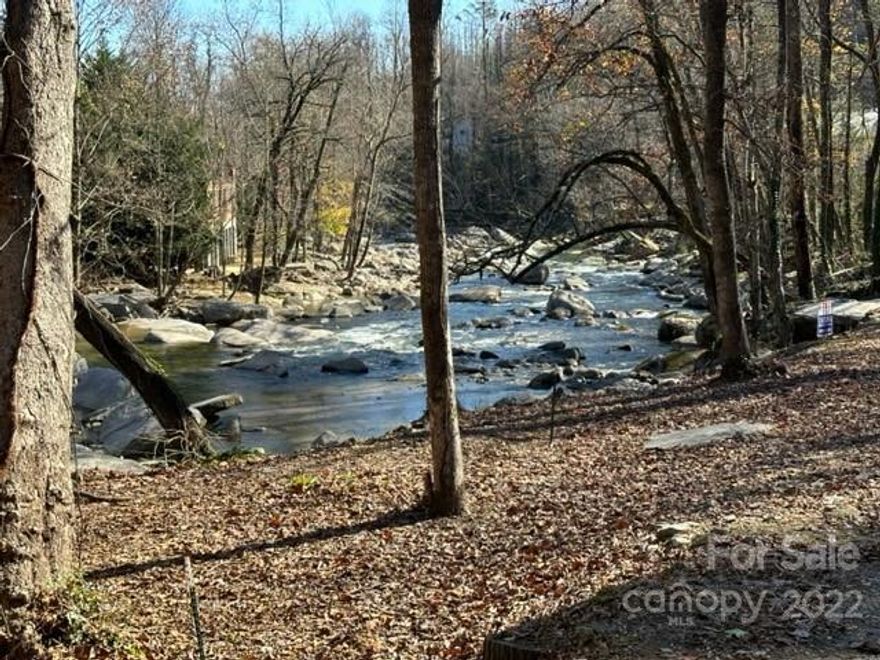 RIVERFRONT 239 ft on the Rocky Broad River.....incredible opportunity to live and enjoy this riverfront location, Build your dream-mountain home. Step out the back for trout fishing or just take in all the pristine beauty and the calming sounds of this bold rushing river, crashing over the massive boulders. This .68 acre offers city water and sewer hookup, all with in the gated Falls at Chimney Rock Development. Listed for $263,000. (must schedule appointments for access through gate)