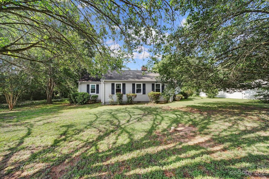 Great starter home that needs a little TLC. Home features eat in kitchen, living room, den that could be 3rd bedroom with addition of wall and utility room. Beautiful shaded lot has attached double carport and detached storage building.