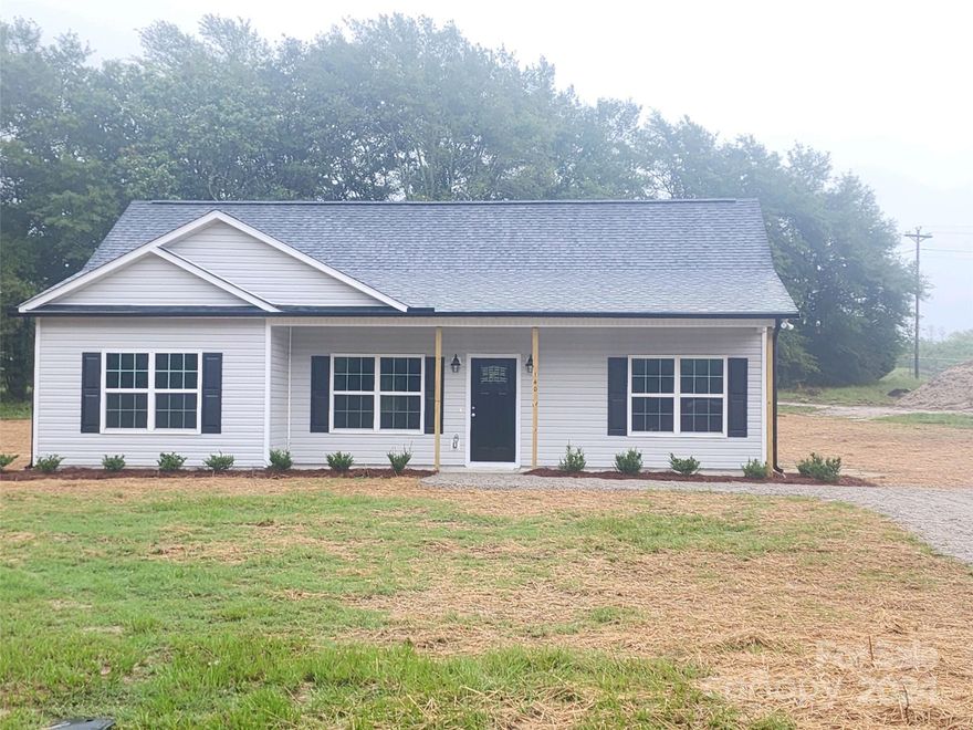 There is no wasted space in this adorable, 3 bedroom, 2 bathroom, proposed to be built floorplan, located on a .84 acre lot. The split bedroom plan affords privacy for the primary bedroom/bathroom, that features double vanity and walk in closet.  The other two bedrooms have easy access to the full hall bathroom.  The eat in kitchen, features granite counters, wood cabinets, SS appliances and is open to the living room with vaulted ceiling.  If you are looking for proposed new construction, outside the city limits of Pageland, this one may be for you!