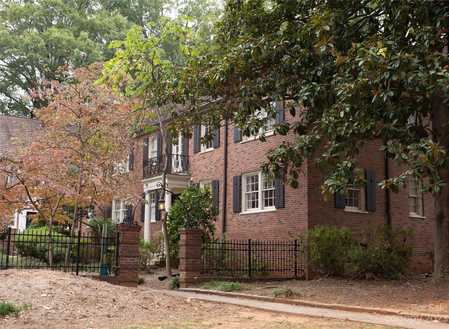 Your chance to live in Eastover's grand and historic Alsons Court is now. Enjoy two peaceful and shady courtyards from the two foyer entrances and the majestic tree lined streets with Charlottes most beautiful homes. Close proximity to shops, restaurants, uptown and SouthPark area.  Charming and quiet 2 bedroom, 1 bath condo is move-in ready. Enter into a secure foyer to this open and spacious home that features the original hardwood parquet flooring, beautifully renewed. Tile in the kitchen and bath. Stainless appliances, newly painted cabinets, tile backsplash, and plenty of counter space in the kitchen. Roomy primary bedroom and second bedroom that could flex as an office. Refinished cast-iron tub and spotless tile. This unit also comes with the highly coveted covered garage space and basement storage area! HVAC unit replaced in March, 2022. Gas, water, sewer, and hot water included in the HOA fees.