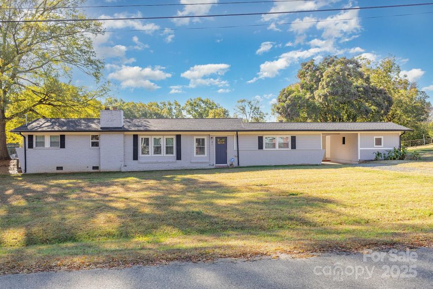 Charming and fully renovated 3-bedroom, 2-bath ranch-style home located in a great community with easy access to all major highways and just minutes from downtown Concord. Updated in 2021 with new windows, roof, cabinets, quartz countertops, appliances, electrical, and plumbing, plus a new HVAC system and flooring installed in 2022. Upgraded features, pops of color, and large windows boasting natural light separate this home from the competition. This spacious home features a large living room and a kitchen/dining combo perfect for gatherings. Enjoy the freedom of no HOA and a generous half-acre lot offering endless possibilities for outdoor living. A covered rear screened porch and a storage/workshop area add extra convenience and charm—schedule your tour today!