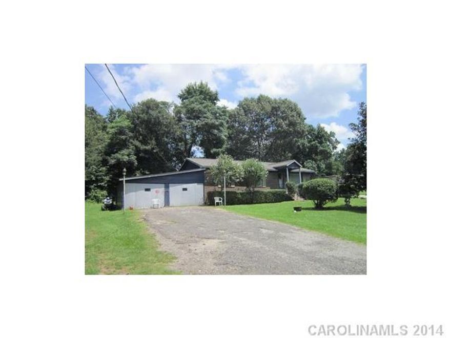 Attention Investors!  Brick ranch located on spacious corner lot.  Lots of storage.