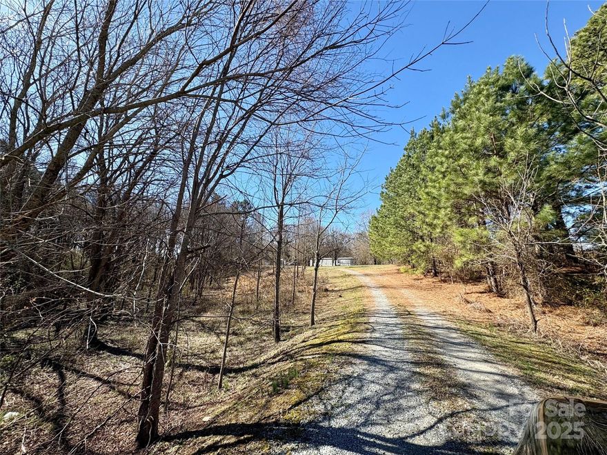 26.41 Gorgeous Wooded Acres in Union County! Calling all developers! Any way you stack it, this is a great investment. Ideal for development. Soil tests complete with potential of over 16 sites. Red soil with pits open for visibility. Multiple ideal home sites. Peaceful and serene views all around. Small creek and a gentle rolling topography adds much character for the nature lover! Ellis Griffin Road and the general area is beautiful with very nice and new home sites adjacent to the subject property. Agents use caution when viewing property due to pits being open. Mobile home does not convey. Do not delay on this one! Contact listing agent for soil report. Survey in process.