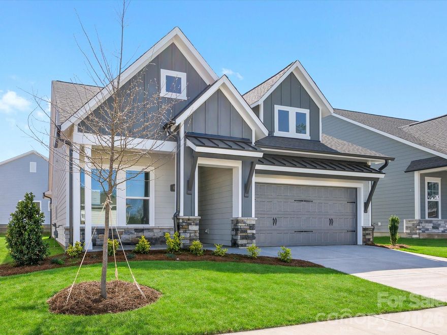 Welcome to your new ranch in Waxhaw, NC.   This award-winning home design highlights everyday conveniences and beauty.   The gourmet kitchen at the heart of your home is designed to be a stylish place to cook signature dishes with ease!   Frost perimeter cabinets are paired with the new wood-tone Quill island.  Solid surface flooring throughout makes for easy maintenance and durability.  Your owner’s retreat, tucked privately at the rear of this ranch,  is a special place to begin and end each day.   A zero- entry shower (with tile to the ceiling) is a showstopper in the owner’s bathroom. A fireplace in the family room is a stunning finishing touch.    Become a part of the Streamside lifestyle today!
